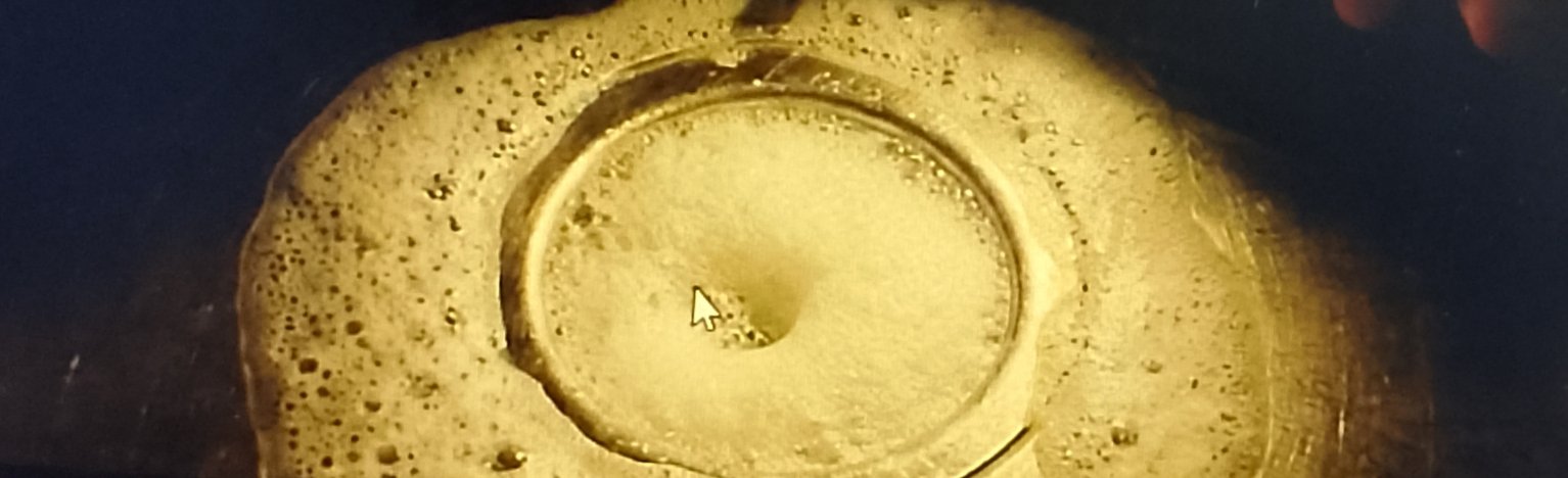bubbling Baking soda and vinegar reacting in the sink drain