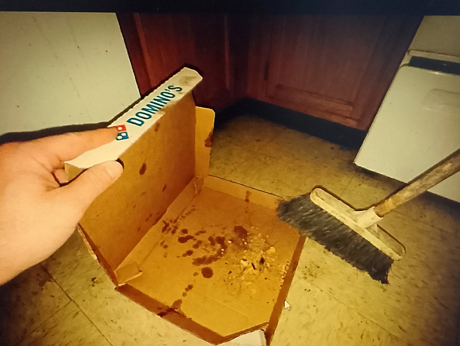 dustpan Using a pizza box lid as a makeshift dustpan for glass