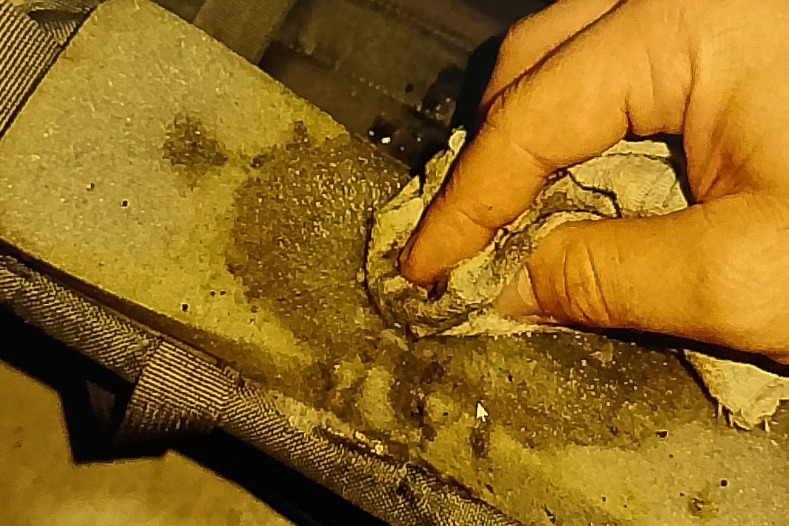 foam turning Scrubbing backpack straps creates grey foam