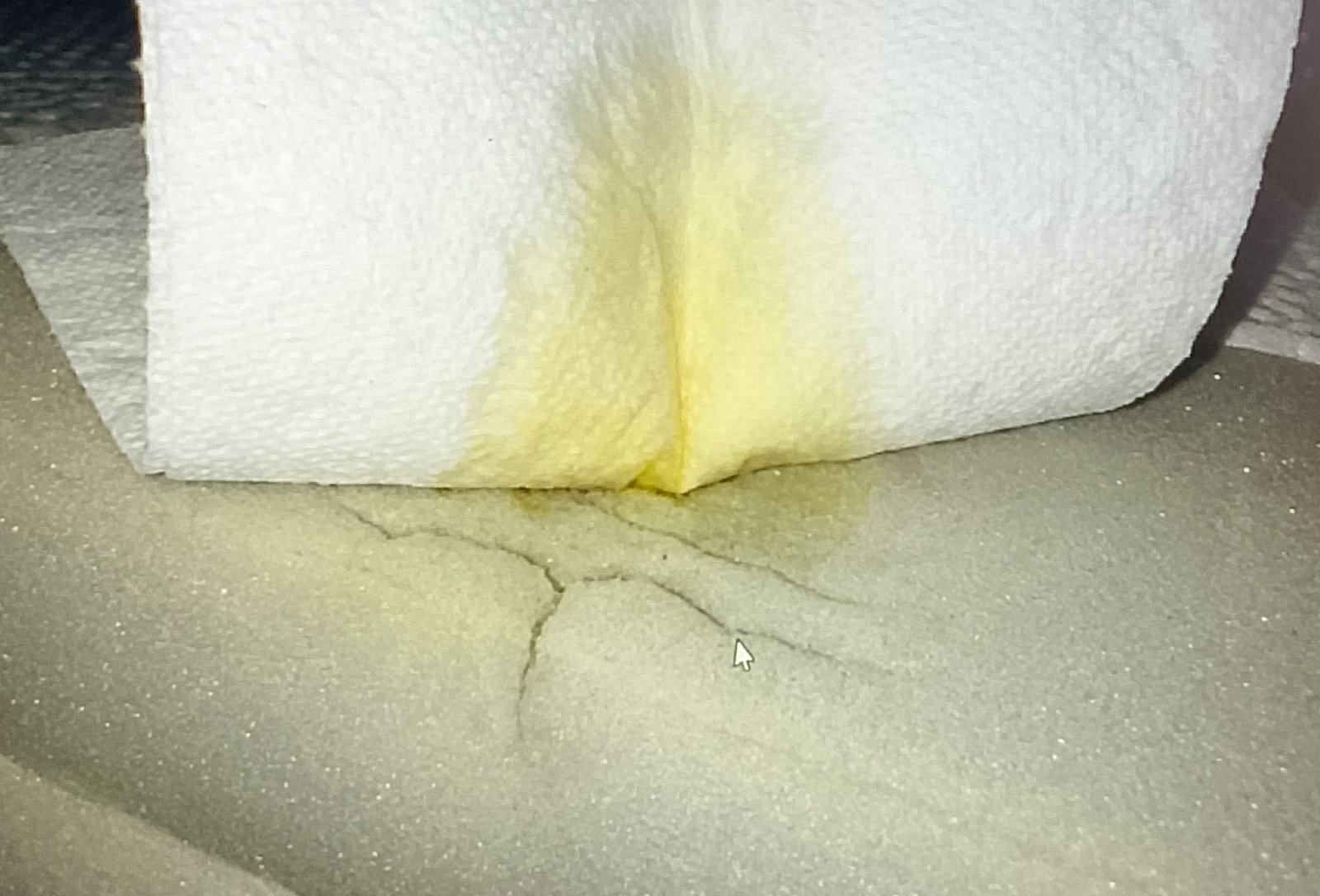 paper towel pressed Pressing paper towel into memory foam mattress to blot urine
