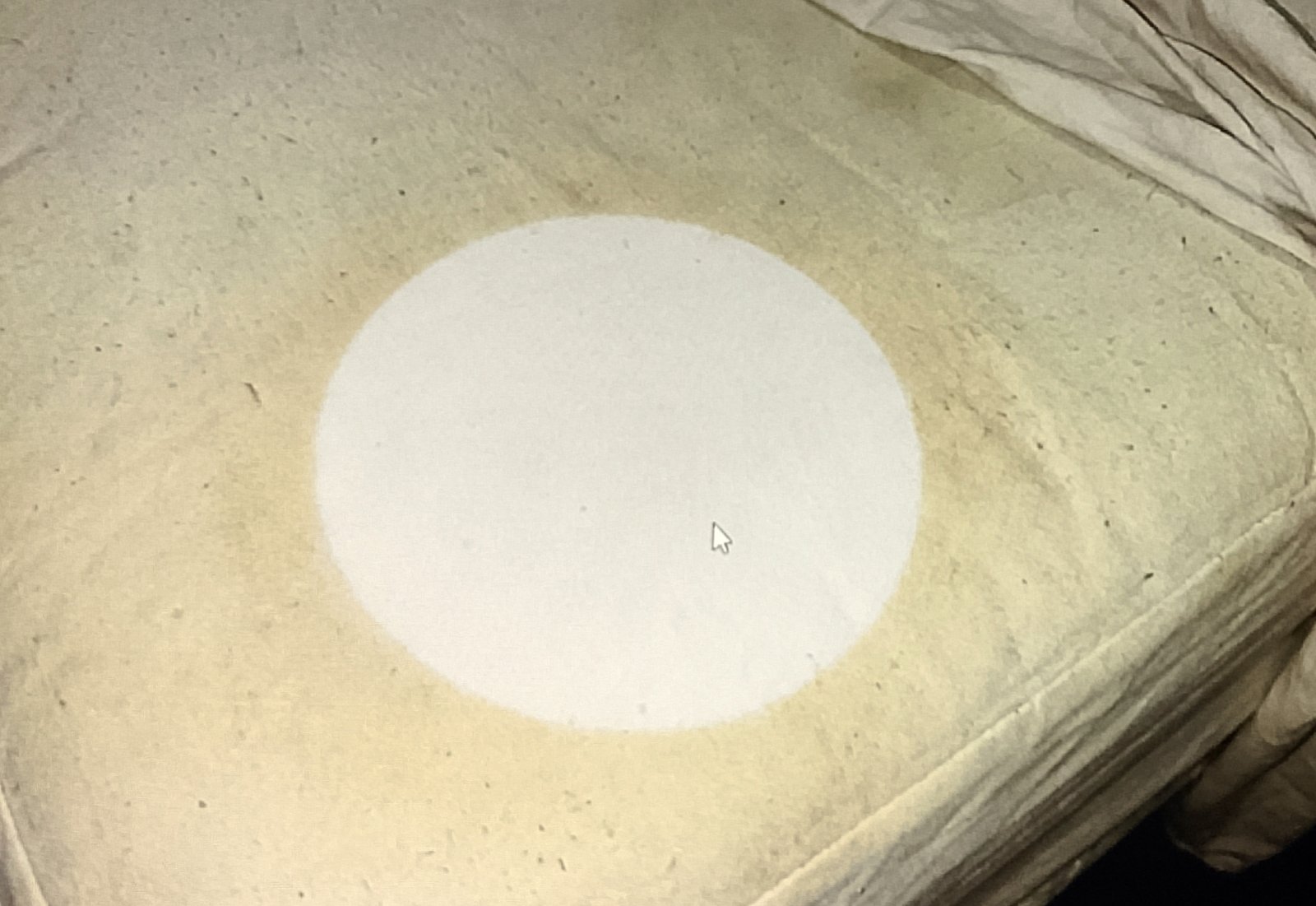 Clean white circle on mattress where yellow stain used to be