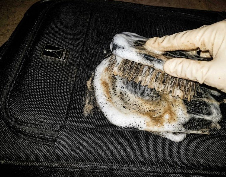 The Foam Method Applying cleaning foam to a Travelpro softside luggage exterior