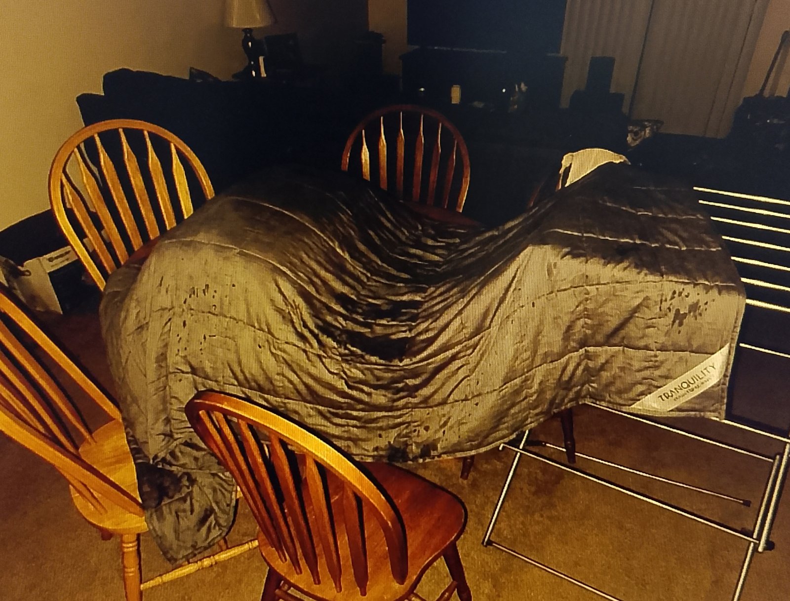 blanket across multiple chairs Weighted blanket drying flat across multiple chairs