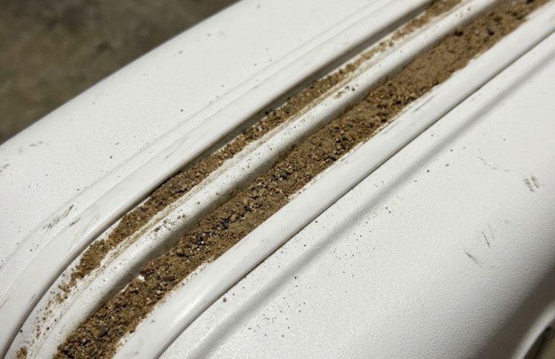 a dry dust and sand sitting in the grooves dry dust and sand sitting in the grooves