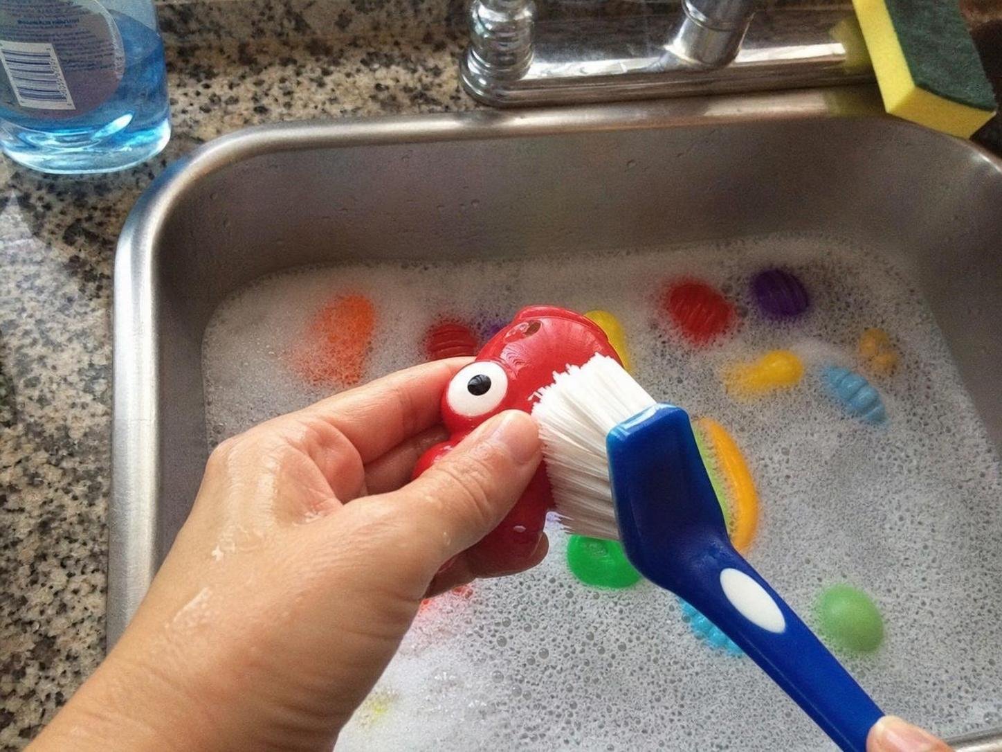 Close-up household cleaning method for how to keep baby toys clean
how to clean toys for newborn