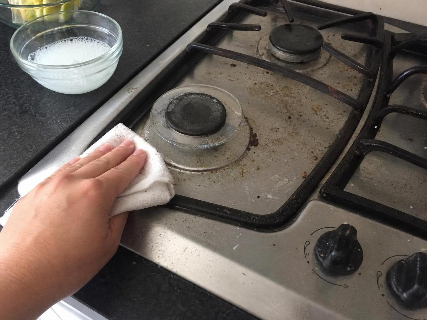 Close-up household cleaning method for non toxic kitchen cleaning checklist; natural & non-toxic cleaning checklist; cleaning supplies checklist; room by room cleaning checklist; deep cleaning schedule; weekly maintenance checklist