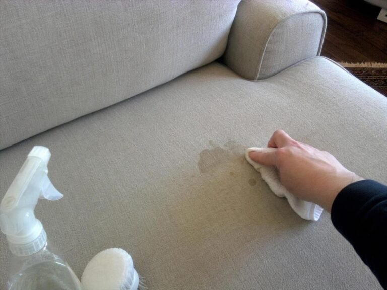 Real household cleaning scene for how to remove grease stains from a fabric sofa; best way to remove grease stains from a fabric sofa; remove grease stains from a fabric sofa without damage; safe cleaner for grease stains from a fabric sofa; how to prevent grease stains from a fabric sofa; grease stains from a fabric sofa cleaning mistakes