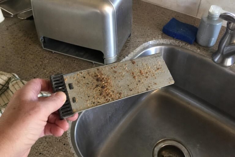 Real household cleaning scene for how to clean a toaster crumb tray; best way to clean a toaster crumb tray; clean a toaster crumb tray without damage; safe cleaner for a toaster crumb tray; a toaster crumb tray cleaning mistakes; how often to clean a toaster crumb tray