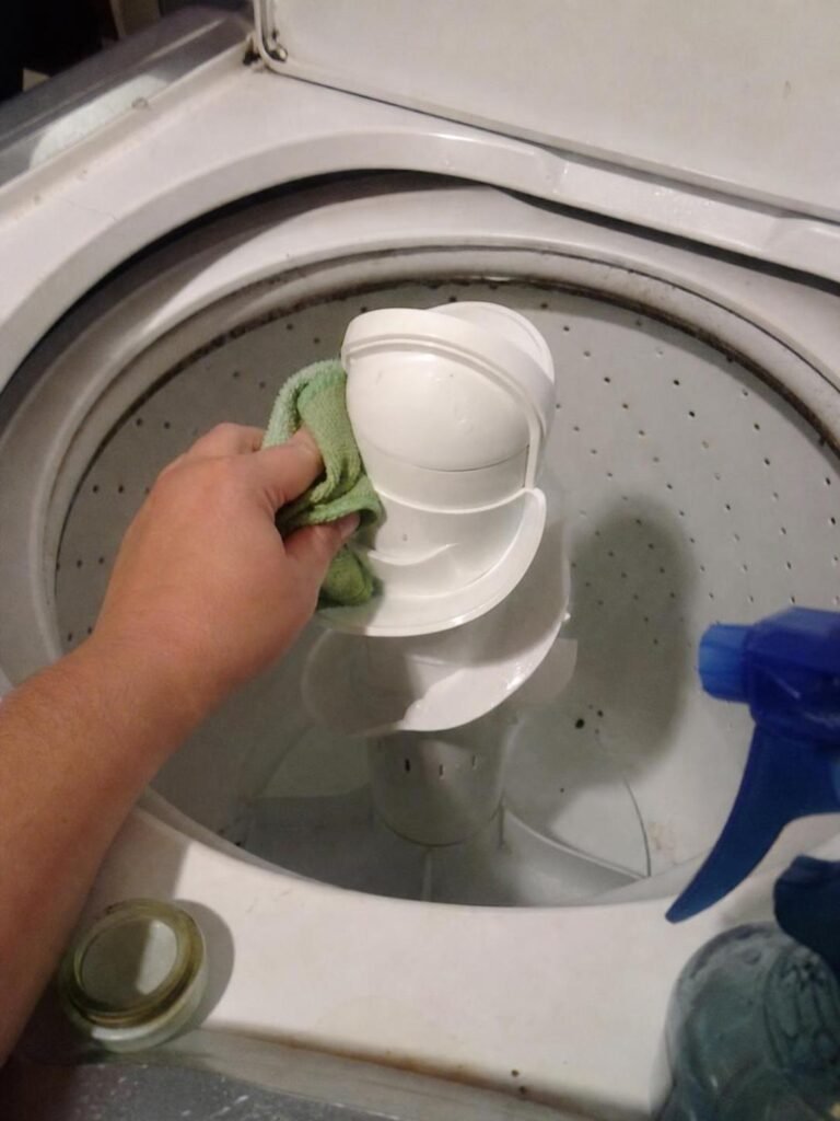 output1 85 Real household cleaning scene for how to clean a top load washing machine agitator; best way to clean a top load washing machine agitator; clean a top load washing machine agitator without damage; safe cleaner for a top load washing machine agitator; a top load washing machine agitator cleaning mistakes; how often to clean a top load washing machine agitator